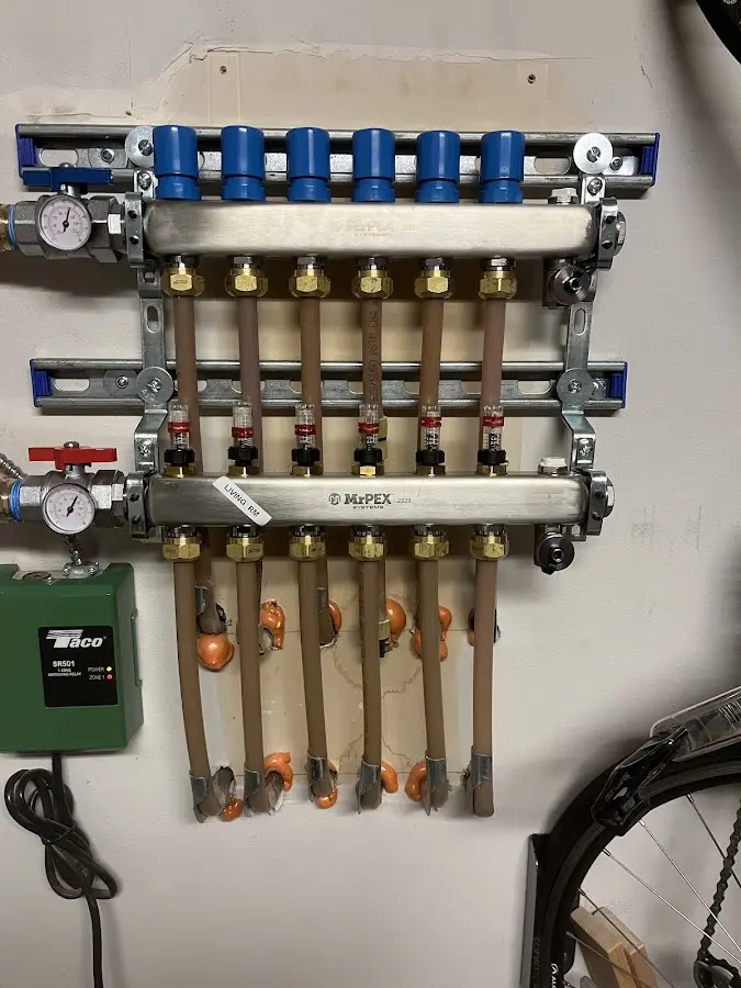 Plumber performing Gas Line Installation at a residential property in Austintown